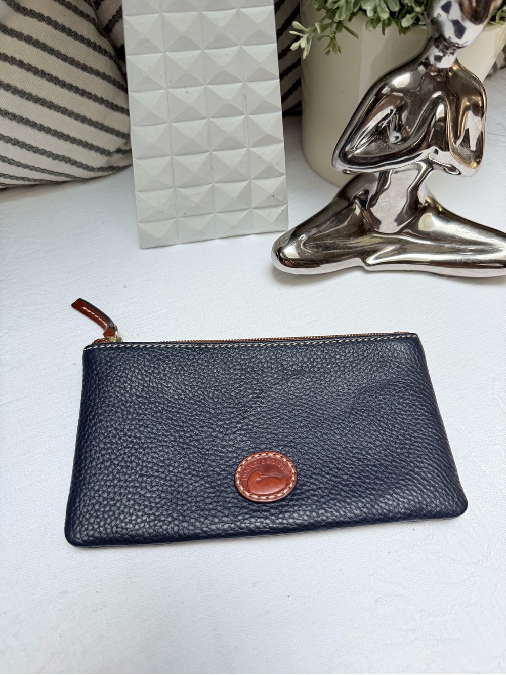 Dooney & Bourke Navy Pebbled Leather Zip Pouch with Brown Accent